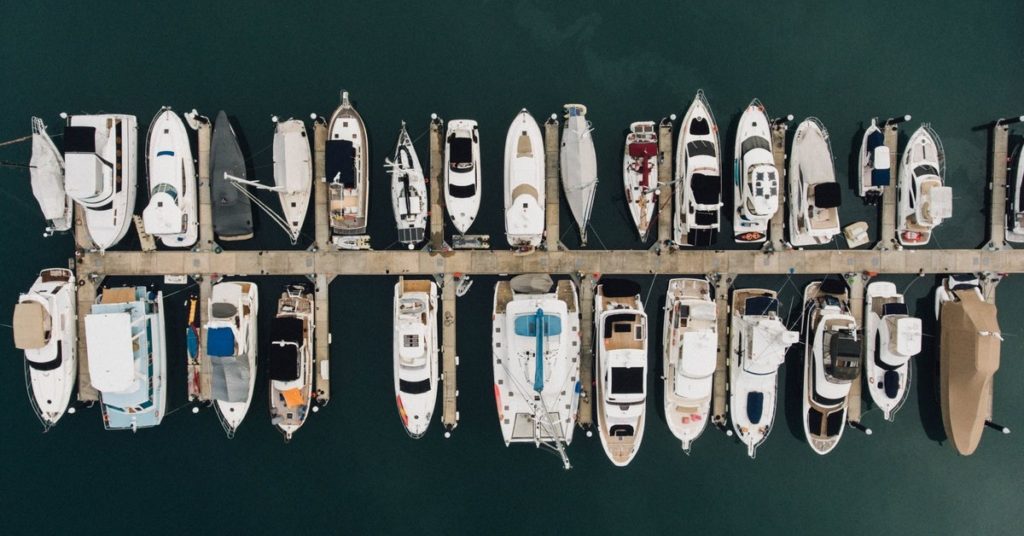 marina with several yachts from above