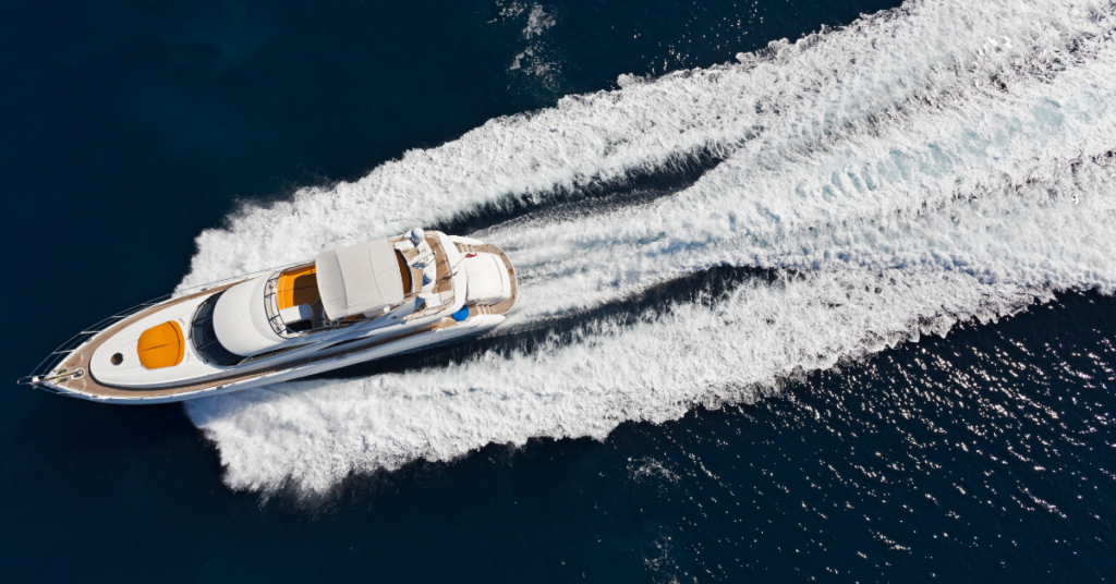 A yacht cutting through the water.